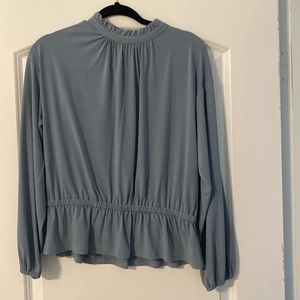Light blue long sleeve blouse